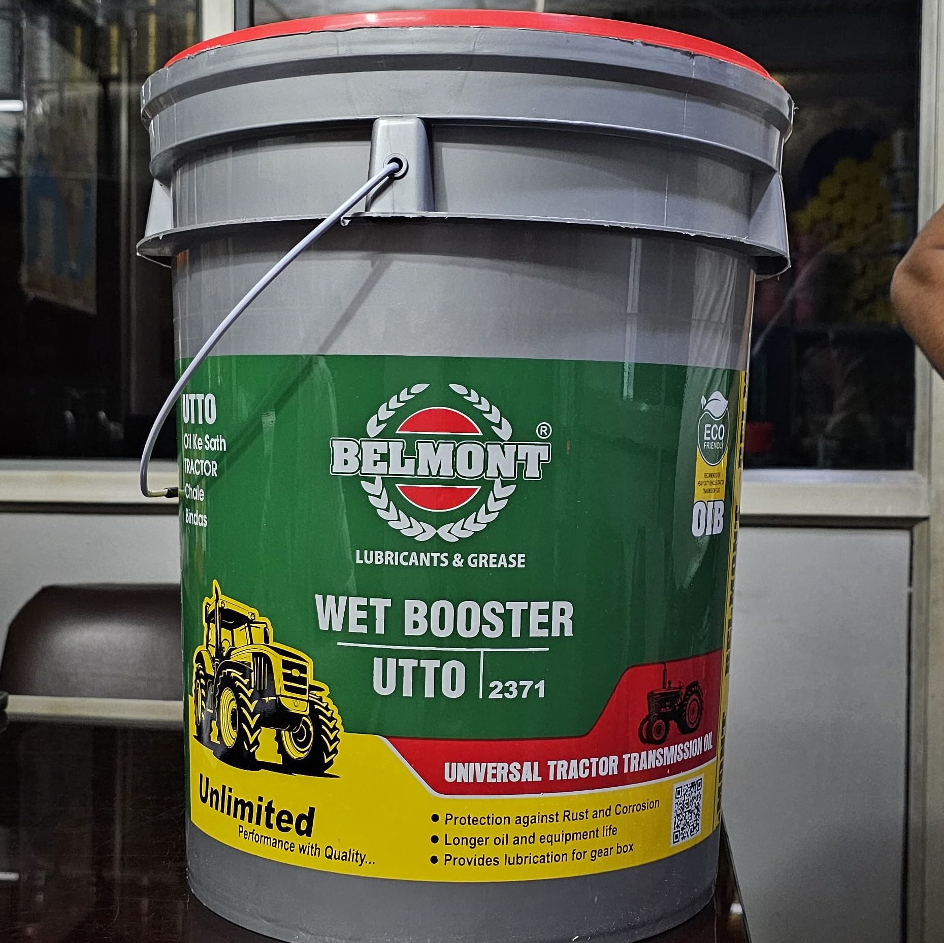 Farmers using Mahindra tractor with Belmont UTTO oil